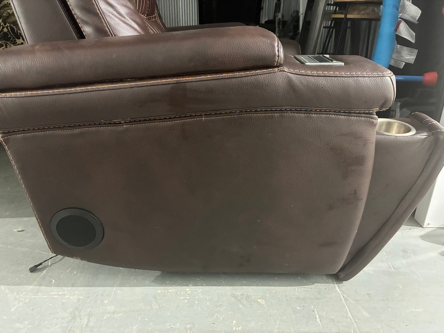 brown leather power recliner theater chair with some premium features.