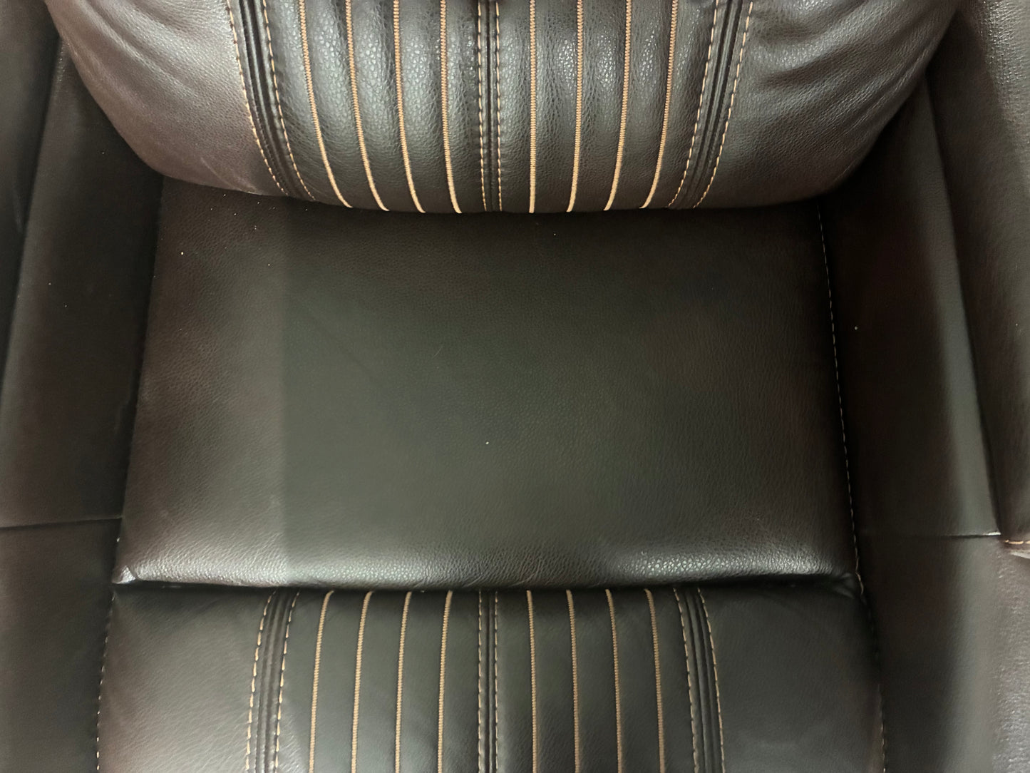 brown leather power recliner theater chair with some premium features.