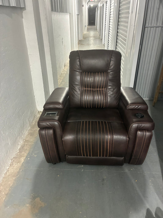 brown leather power recliner theater chair with some premium features.